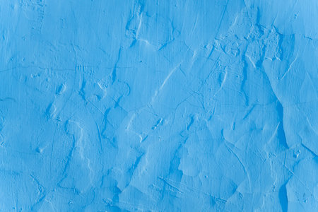 Peeling blue concrete old wall textureの写真素材