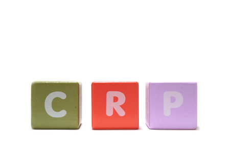 text CRP C Reactive Protein Test on colorful wooden isolated on a white background.