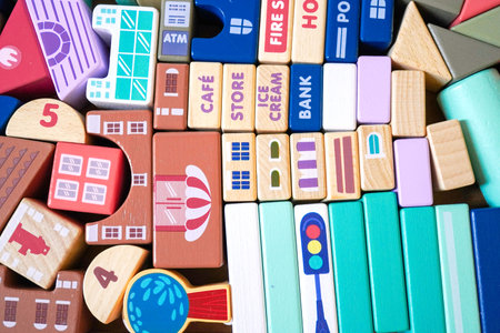 The wooden building blocks are painted in colorful colors and have public places written on them.