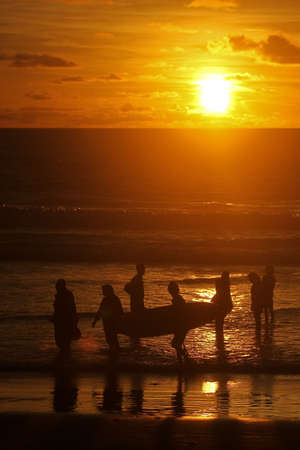 sunset at kuta beach baliの写真素材