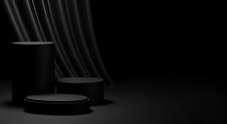 Three black cylindrical pedestals of varying heights and one oval pedestal are arranged in a dark studio setting. Behind them, dark, flowing fabric is draped, creating a soft, elegant backdrop. The scene is lit to emphasize the shapes and textures, with deep shadows.の写真素材