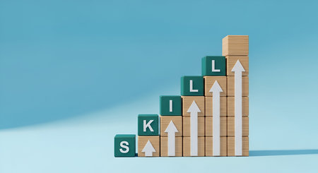 Wooden blocks are arranged in a rising staircase formation against a solid blue background. The blocks spell out the word "SKILL" from left to right. Each block is adorned with a white upward-pointing arrow, symbolizing growth and progress. The overall arrangement conveys a message of skill development and advancement.の写真素材
