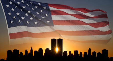 A large American flag billows majestically in the foreground, its stars and stripes vibrant against a warm sunset sky. Behind the flag, the iconic silhouette of the Twin Towers is visible, superimposed over a city skyline. The sun is setting, casting a golden glow and creating a poignant and historical scene. The image evokes patriotism and remembrance.の写真素材