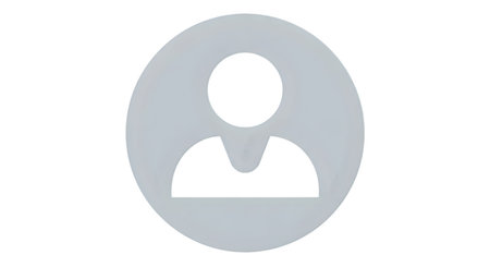 A minimalist icon representing a person is displayed within a light gray circle against a black background. The icon features a solid black silhouette of a head and shoulders, with a rounded top representing the head and a trapezoidal shape for the shoulders.の写真素材