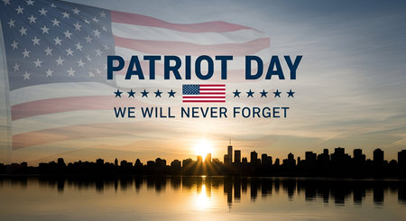 A powerful image commemorating Patriot Day features a large American flag waving against a sunset...