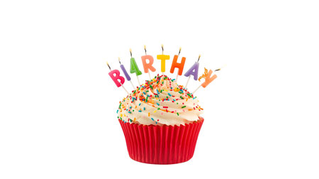 A single red cupcake with white frosting and colorful sprinkles is decorated with seven letter candles spelling out "BIRTHDAY". The candles are lit and stand upright on the frosting. The cupcake is presented against a solid black background in a studio setting.の写真素材