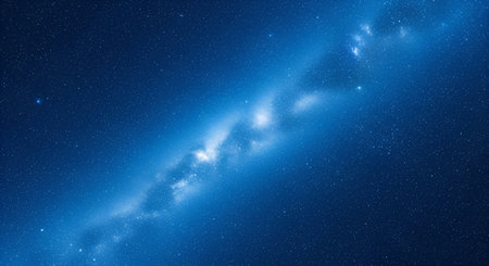A deep space view showcases a luminous blue nebula with a wispy, glowing core. Countless stars are...