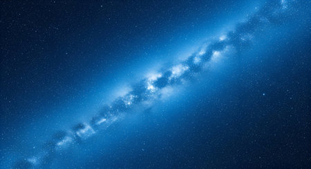 A stunning view of the Milky Way galaxy, rendered in vibrant shades of blue. Countless stars and...