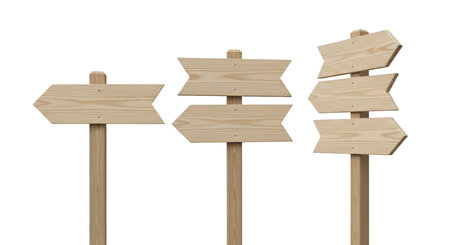Three wooden signposts stand vertically, each topped with blank, arrow-shaped signs. The signs are made of light-colored wood and are attached to wooden posts. The signs are positioned to indicate different directions, offering a visual representation of choices or guidance.の写真素材