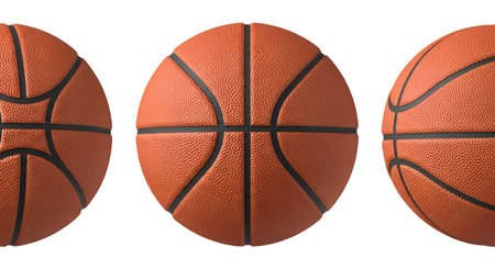 Three textured orange basketballs are displayed side-by-side, each showcasing a different perspective. The central ball is viewed directly from the front, revealing its iconic seam pattern. The ball on the left is shown at an angle, emphasizing its curvature, while the ball on the right is viewed from a profile, highlighting its spherical shape. All are presented on a white background.の写真素材