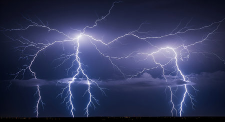 A dramatic night sky filled with dark, ominous clouds is illuminated by multiple powerful lightning...