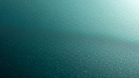 Green metal texture useful as a background - soft focus, shallow DOF