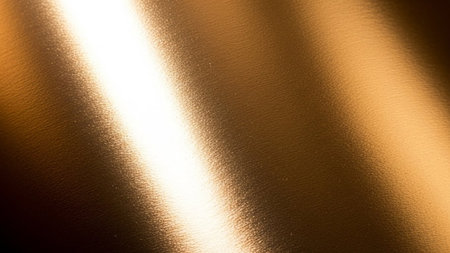 Gold metal background or texture and gradients shadow. Abstract gold background.