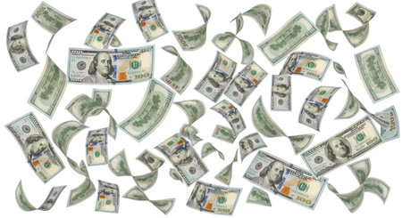 Numerous US one hundred dollar bills are depicted in motion, appearing to fall and fly through the air against a black background. The bills are scattered and some are curled, suggesting a dynamic and chaotic flow of money.の写真素材