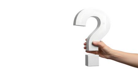 A human hand is holding a large, three-dimensional white question mark. The question mark is stylized and solid. The hand is positioned to grip the lower curve and the dot of the symbol. The image is isolated on a black background, emphasizing the question mark.の写真素材