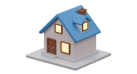 A stylized 3D cartoon illustration of a small house with a white body, a bright blue pitched roof, and a brown chimney. Two windows on the front and one on the side are illuminated with a warm yellow light. A brown front door with steps leads to the entrance. The house sits on a white base, isolated against a black background.の写真素材