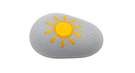 A smooth, gray, oval-shaped pebble is adorned with a painted yellow and orange sun. The sun has a circular center and radiating lines representing rays. The pebble is presented against a white background, highlighting the simple, cheerful artwork.
