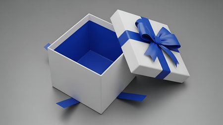 An open white gift box with a vibrant blue interior and matching blue ribbon tied in a bow on the...