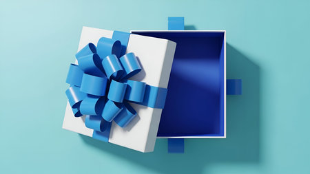 Image showing open white gift box with blue ribbon and bow. Clear details and vibrant colors enhance...
