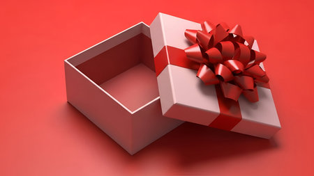 An open white gift box with a vibrant red ribbon and a large, ornate red bow sits on a solid red...