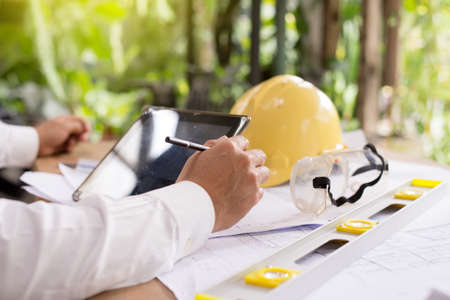 Interior designer works on a hand drawing sketch and tablet  pencils, ruleの写真素材