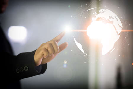 Man hand holding our planet earth glowing connection concept.の写真素材