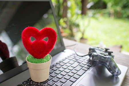 Heart and Tree, Growing Love Tree on notebookの写真素材