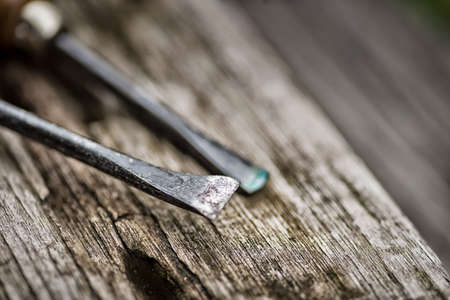 Old used wood chisels selection on the wooden table,High Dynamic Range tone