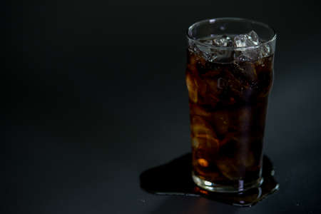 Cola with ice in glassの写真素材