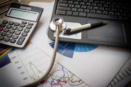 Medical stethoscope on the keyboard of computer notebookの写真素材