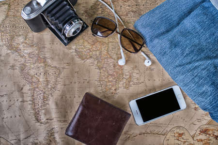 Accessories for travel,wallet,photo camera, smart phone,sunglass,smalltalk and travel map High Dynamic Range tone.の写真素材
