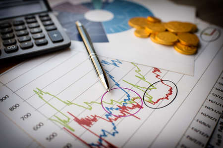 Financial analyzing concept, Pen and calculatorの写真素材