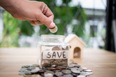 Concept of saving money for house.Business Finance and Money concept,Save money for prepare in the futureの写真素材