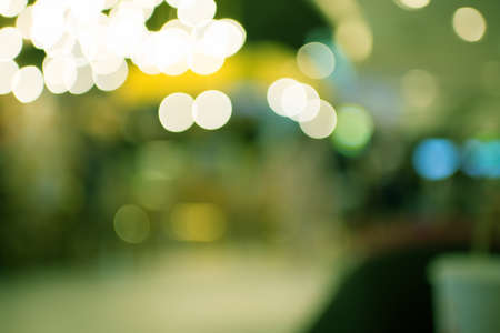 Green glitter vintage lights bokeg background. defocusedの写真素材