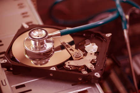 Check hard disc drive repair macro,red toneの写真素材