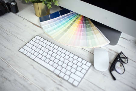 Color palette guide on white background,Focus exclusively on ,table working on laptop computerの写真素材