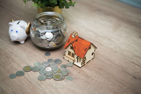 Business, finance, saving money, property loan or mortgage conceptの写真素材