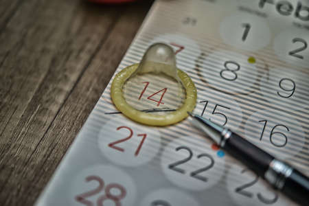 condom on the calendar with the date of February 14 Valentine's day,High Dynamic Range toneの写真素材