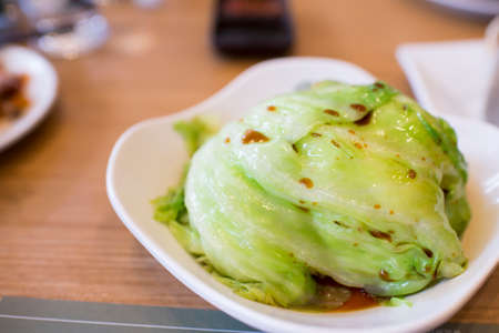 Chinese dim sum in dish on tableの写真素材