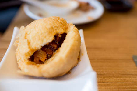 Chinese dim sum in dish on tableの写真素材