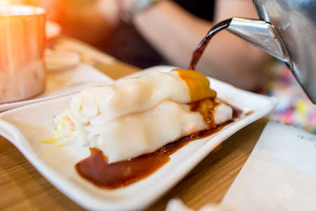 Chinese dim sum in dish on tableの写真素材