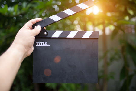 Clapper board,Movie clapper in handの写真素材