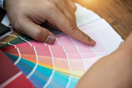 Different colour swatches with paintbrushの写真素材