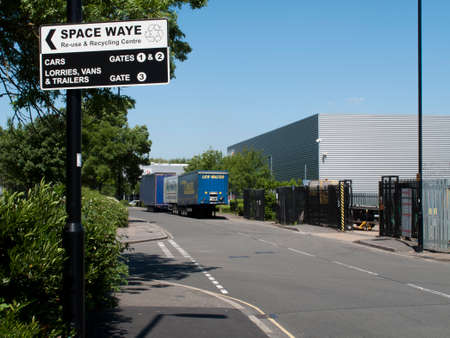 Space Waye recycling centre roadside direction sign mounted on lamppost
