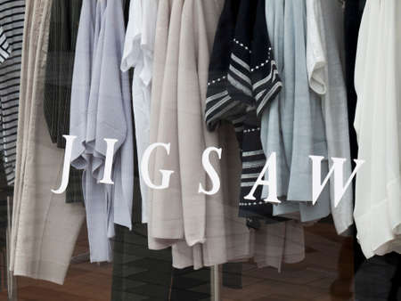 Jigsaw name in shop window, ladies clothing retailer, company founded in 1972 by John Robinson and Malcolm Websterのeditorial素材