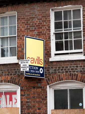 Estate Agent freehold auction sign for vacant office space