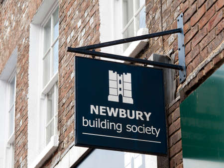 Newbury Building Society signs over local branch, established in 1856, mutual organisation owned by...