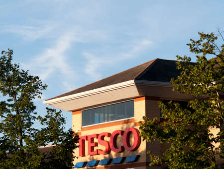 Tesco Extra supermarket name over store entrance, company founded by Jack Cohen in 1919のeditorial素材