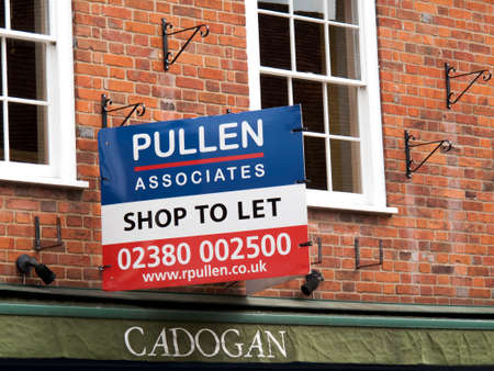 Pullen Associates shop to let advertising sign over vacant retail premisesのeditorial素材