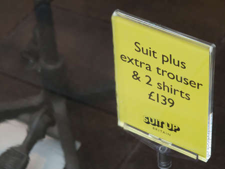 Moss Bros suit up Britain campaign advertising suit plus extra trouser and two shirts, UK Menswear Company founded in 1851by Mosses Mossのeditorial素材